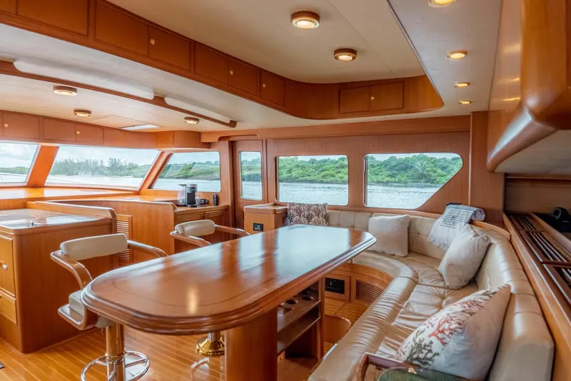 Slide: The Image of Luxurious interior of 2006 Marlow 72E LRC yacht with ocean view and elegant furnishings. - 11