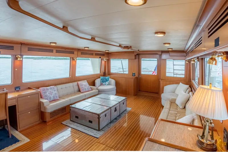 Slide: The Image of Spacious deck of 2006 Marlow 72E LRC yacht with seating and scenic view. - 7