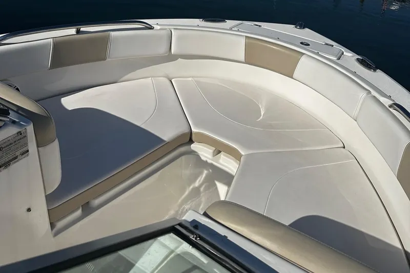 Slide: The Image of 2018 Robalo R227 Dual Console boat with spacious seating area. - 4