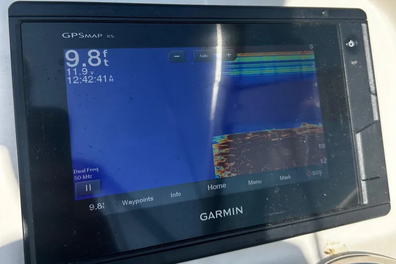 Slide: The Image of Garmin GPSMAP XS displaying depth of 9.8 feet on a 2018 Robalo R227 Dual Console. - 7