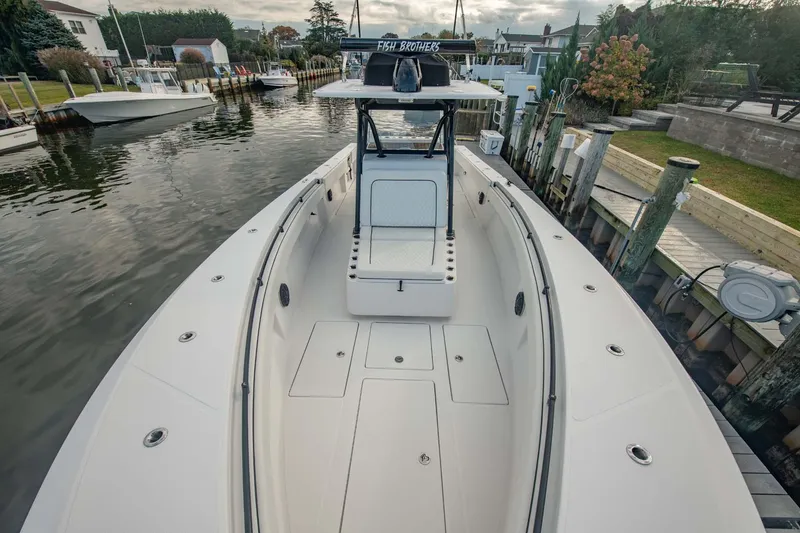 Slide: The Image of 2016 SeaHunter 35 Tournament boat docked in a scenic marina. - 10