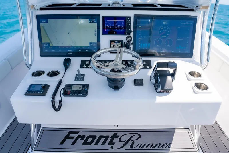 Slide: The Image of 2022 Front Runner 39 Center Console dashboard with advanced navigation and control systems. - 15