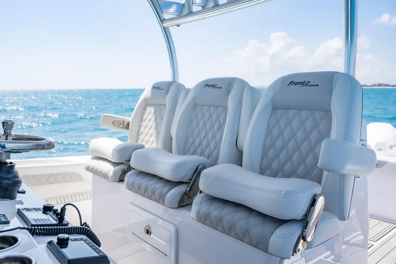 Slide: The Image of Luxurious seating on 2022 Front Runner 39 Center Console boat with ocean view. - 16