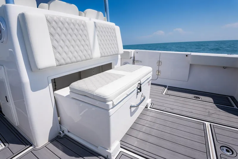 Slide: The Image of 2022 Front Runner 39 Center Console boat with cushioned seating and ocean view. - 19