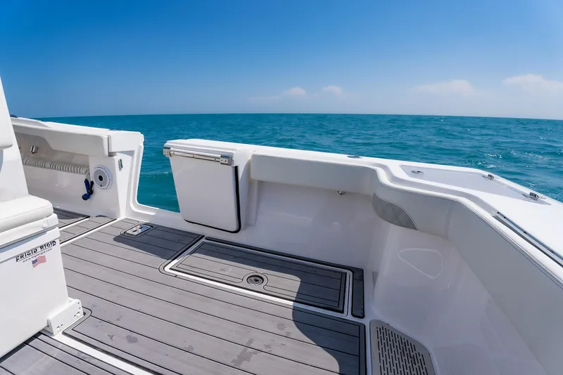 Slide: The Image of 2022 Front Runner 39 Center Console boat deck with ocean view. - 21