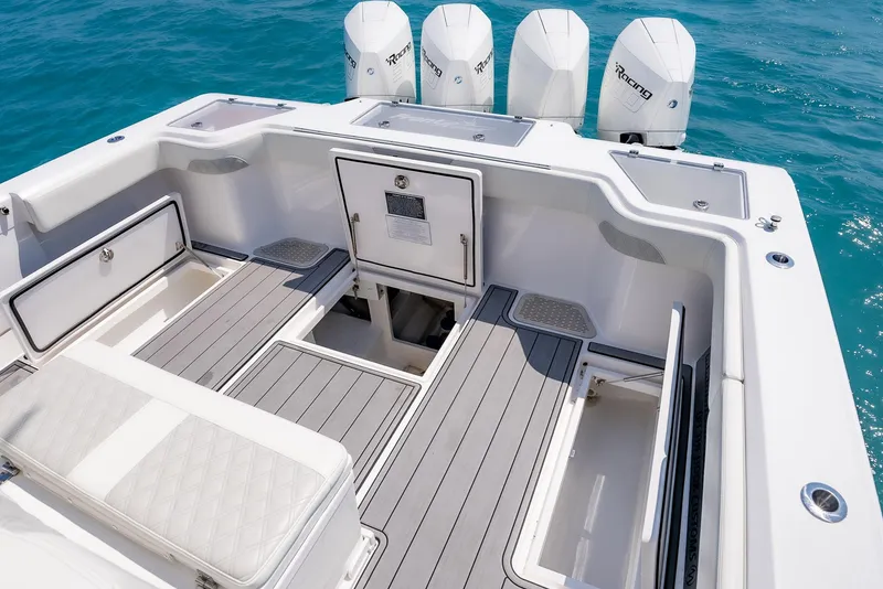 Slide: The Image of 2022 Front Runner 39 Center Console boat with spacious deck and four powerful engines. - 22