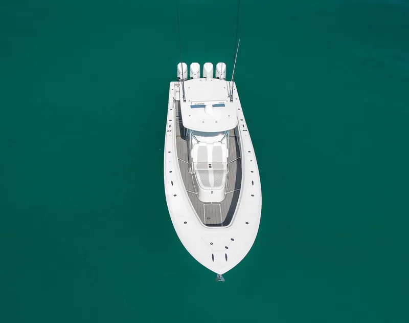 Slide: The Image of Aerial view of 2022 Front Runner 39 Center Console boat on clear water. - 29
