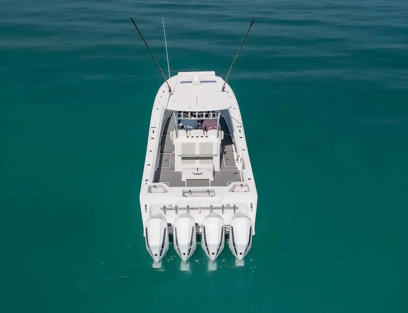 Slide: The Image of 2022 Front Runner 39 Center Console boat on clear blue water. - 30