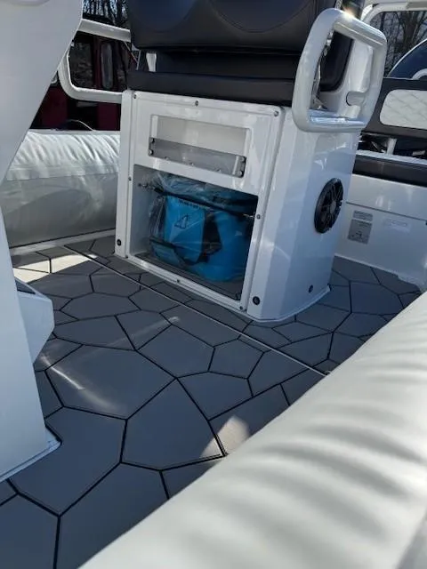 Slide: The Image of 2025 Highfield Sport 560 boat with sleek design, spacious deck, and modern features. - 11