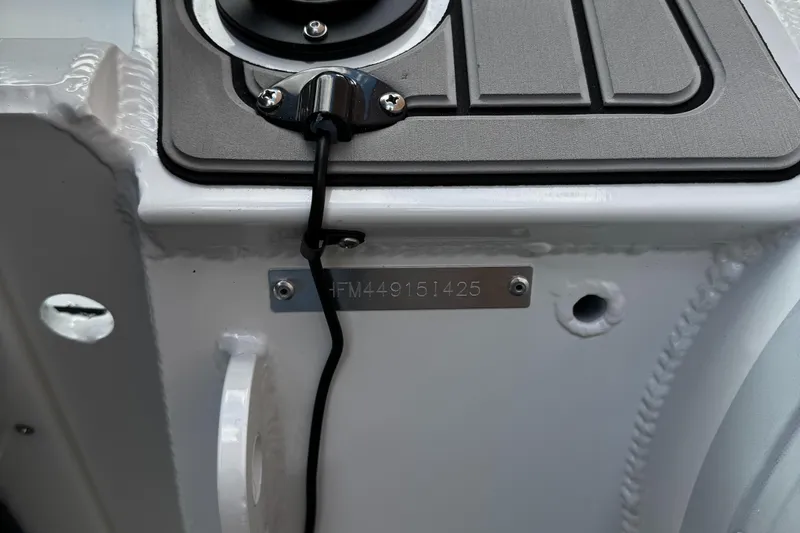 Slide: The Image of 2025 Highfield Sport 390 boat detail with serial number plate and wiring. - 7