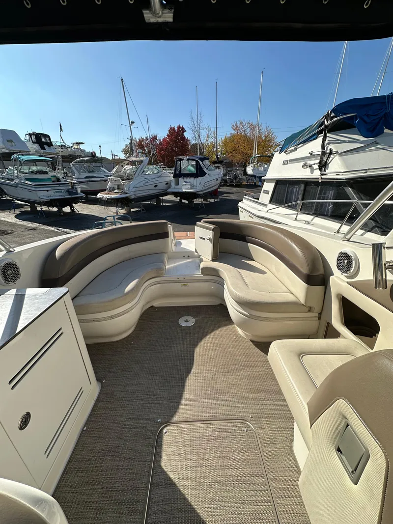 Slide: The Image of 2013 Sea Ray 300 SLX boat interior with spacious seating and elegant design. - 6