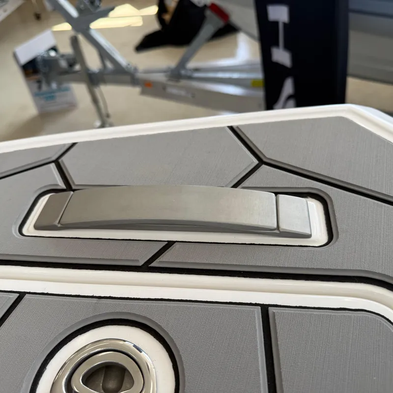 Slide: The Image of Close-up of 2025 Highfield Sport 700 boat deck handle and latch. - 17
