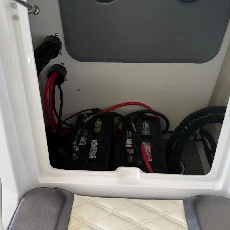 Slide: The Image of Anchor compartment of 2025 Highfield Sport 700 boat with chain and winch. - 19