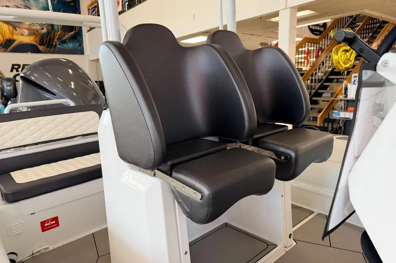 Slide: The Image of Highfield Sport 700 boat seats, 2025 model, in a showroom setting. - 31