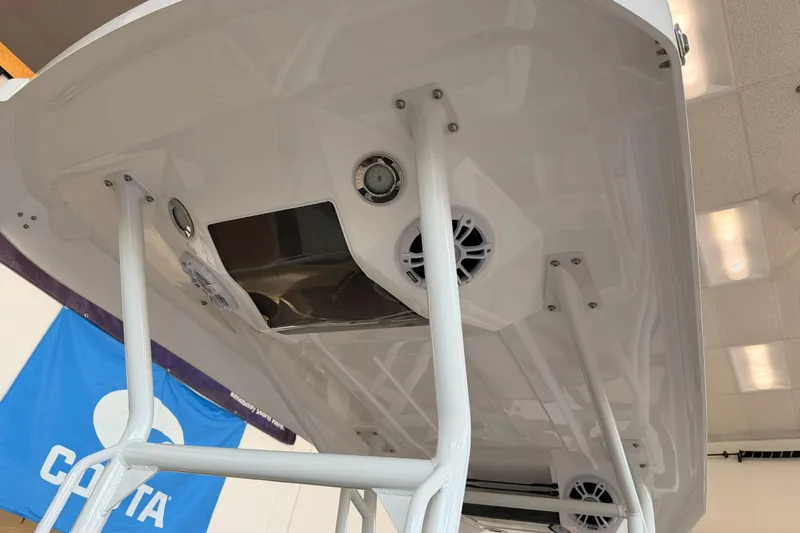 Slide: The Image of Underside view of 2025 Highfield Sport 700 boat canopy with speakers and lights. - 40
