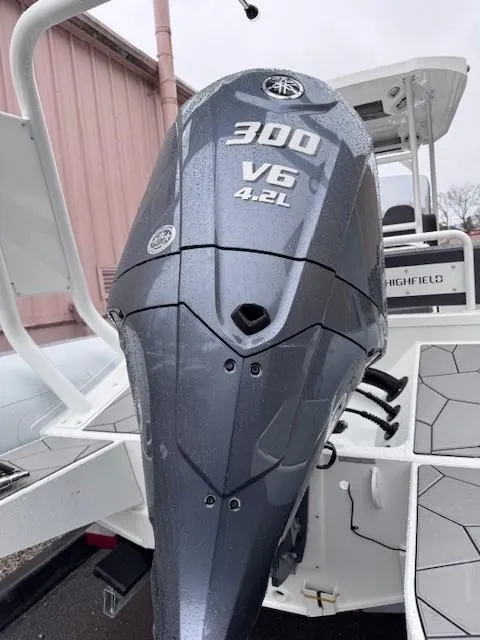 Slide: The Image of 2025 Highfield Sport 760 boat with 300 V6 4.2L engine. - 2