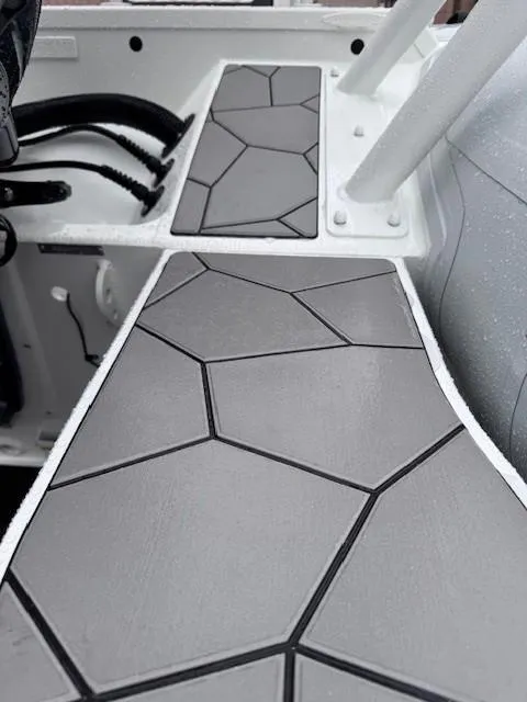 Slide: The Image of Highfield Sport 760 2025 boat deck with geometric pattern design. - 8