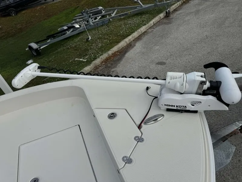 Slide: The Image of Ranger 2360 Bay 2025 boat seats with elegant white upholstery and diamond stitching. - 14