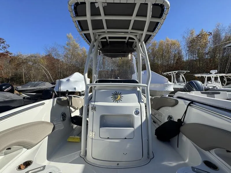 Slide: The Image of 2021 Finseeker 200 FS boat interior with seating and console, outdoors. - 11