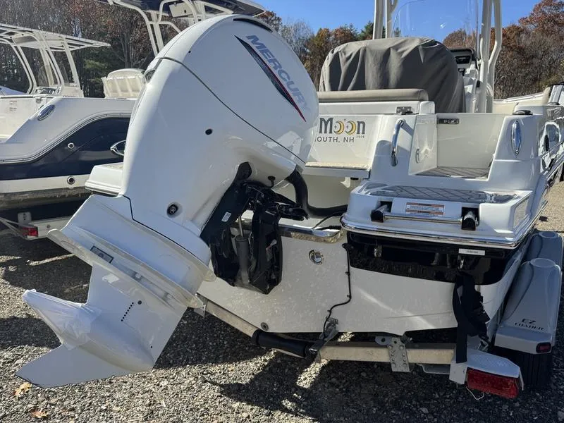Slide: The Image of 2021 Finseeker 200 FS boat with Mercury outboard motor, parked outdoors. - 3