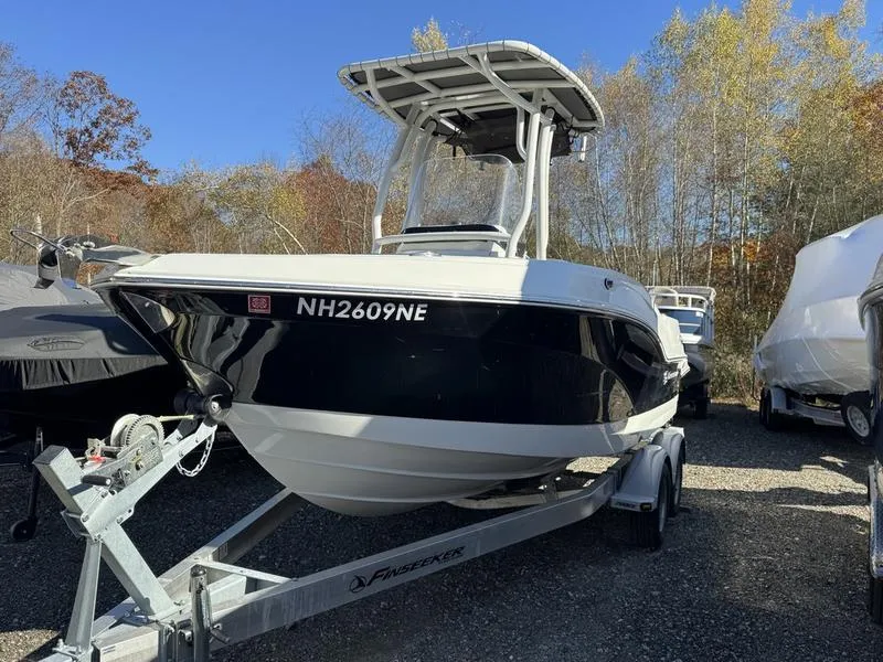 Slide: The Image of 2021 Finseeker 200 FS boat on trailer in outdoor setting. - 9
