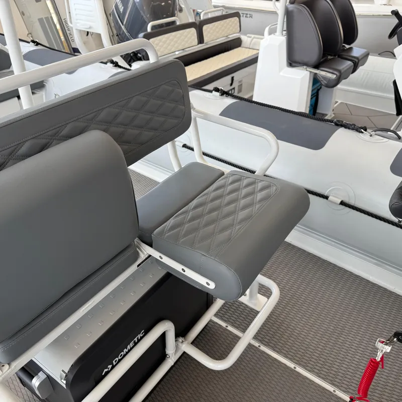 Slide: The Image of Interior seating of 2025 Highfield Patrol 860 boat with quilted upholstery. - 13