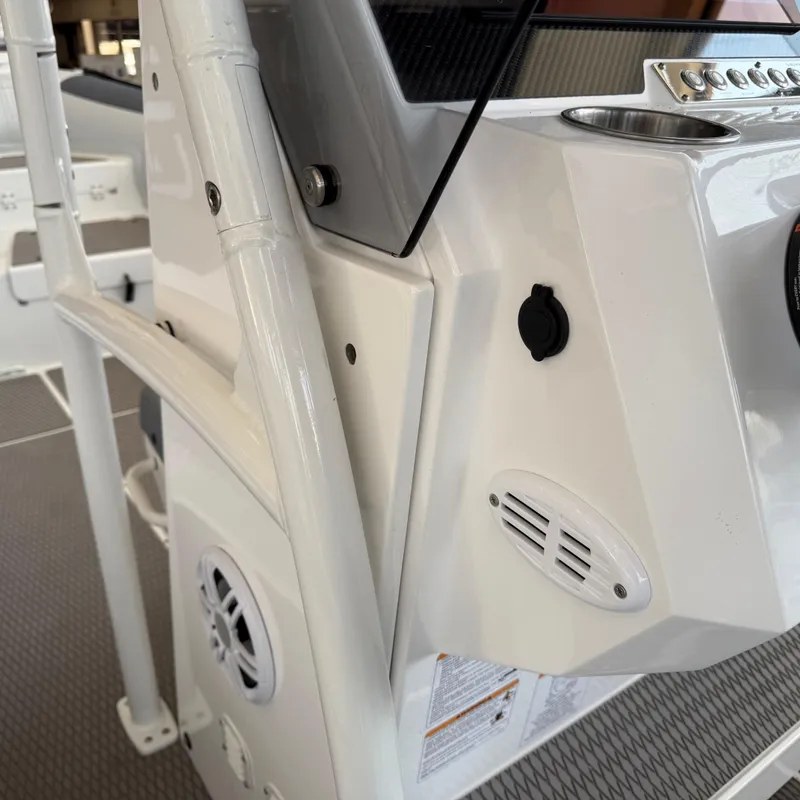 Slide: The Image of 2025 Highfield Patrol 860 boat console with speakers and controls. - 17