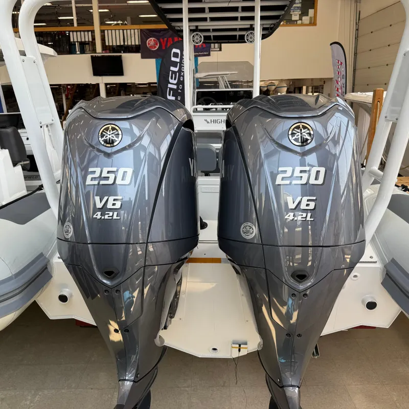 Slide: The Image of Twin Yamaha 250 V6 outboard engines on a 2025 Highfield Patrol 860 boat. - 27