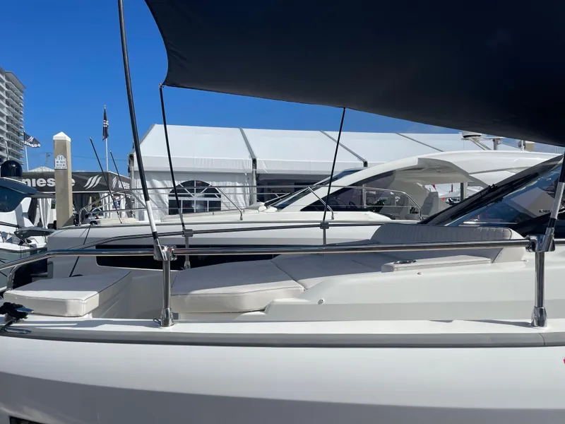 Slide: The Image of 2025 Jeanneau DB/37 OB luxury yacht at a boat show. - 5