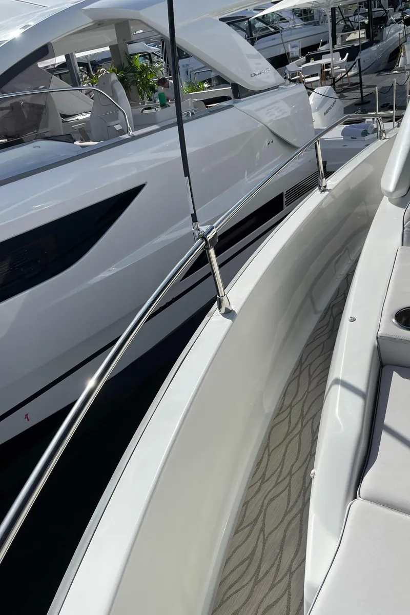 Slide: The Image of 2025 Jeanneau DB/37 OB luxury yacht with sleek design and modern features. - 10