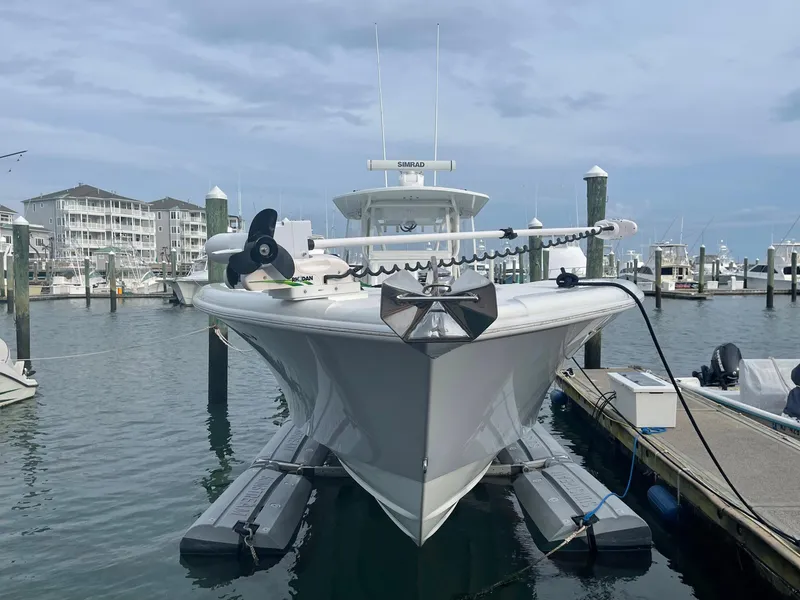 Slide: The Image of 2009 Yellowfin 36 Center Console boat docked at marina. - 3