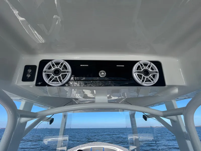 Slide: The Image of 2022 Fountain 34 SC boat speakers with ocean view. - 25