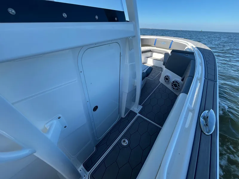 Slide: The Image of 2022 Fountain 34 SC boat interior with sleek design and ocean view. - 29