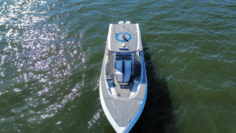 Slide: The Image of Aerial view of 2022 Fountain 34 SC boat on water. - 8