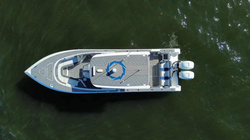 Slide: The Image of Aerial view of 2022 Fountain 34 SC boat on water. - 9