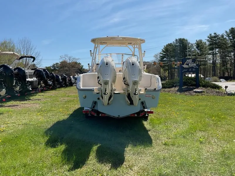 Slide: The Image of 2025 Grady-White Freedom 275 boat interior with seating and helm, viewed from above. - 7