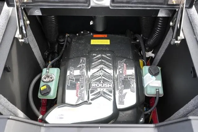 Slide: The Image of 2021 Supra SE 450 engine compartment with Roush Raptor branding. - 18