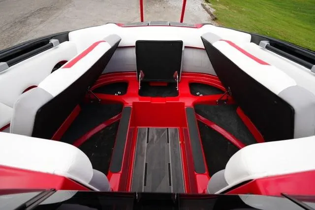 Slide: The Image of Interior of 2021 Supra SE 450 boat with red and white seating. - 7