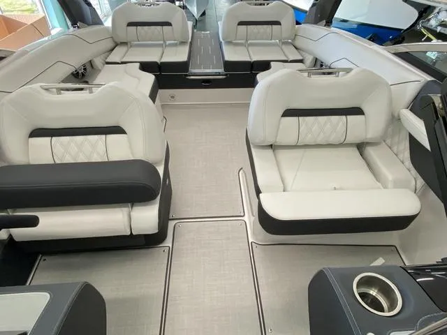 Slide: The Image of Luxurious interior of 2025 Regal LS4 boat with plush seating and modern design. - 16
