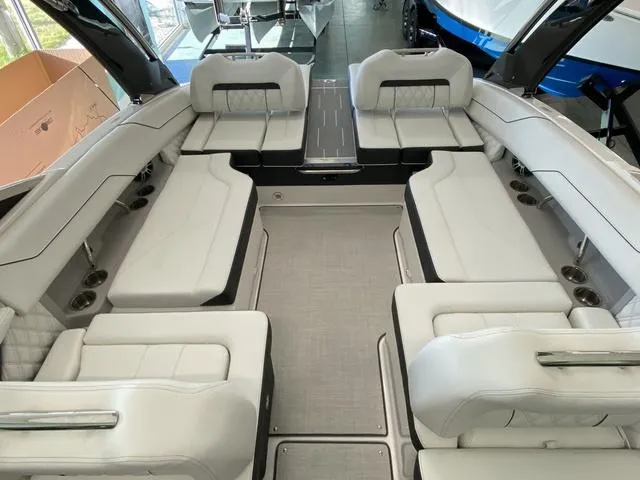 Slide: The Image of 2025 Regal LS4 boat interior with spacious seating and modern design. - 20