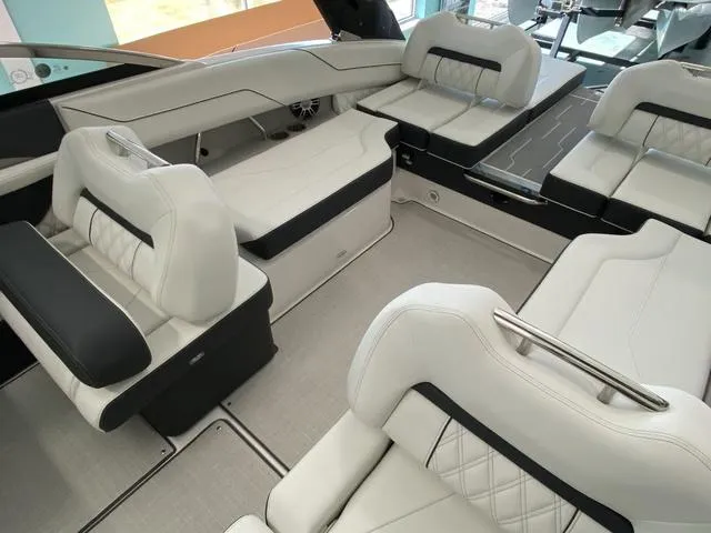 Slide: The Image of Luxurious 2025 Regal LS4 boat interior with elegant white seating and modern design. - 23