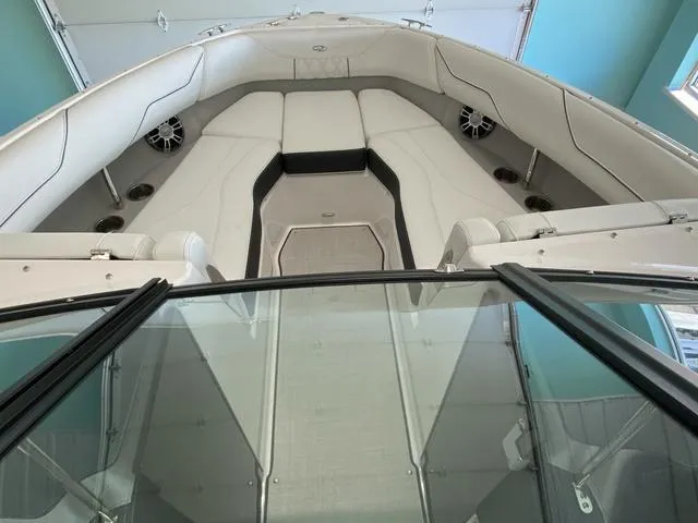 Slide: The Image of 2025 Regal LS4 boat interior with white seating and modern design. - 30