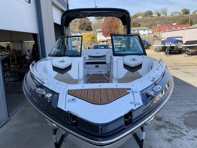 Slide: The Image of 2017 Monterey 278SS boat with open bow, docked outdoors. - 4