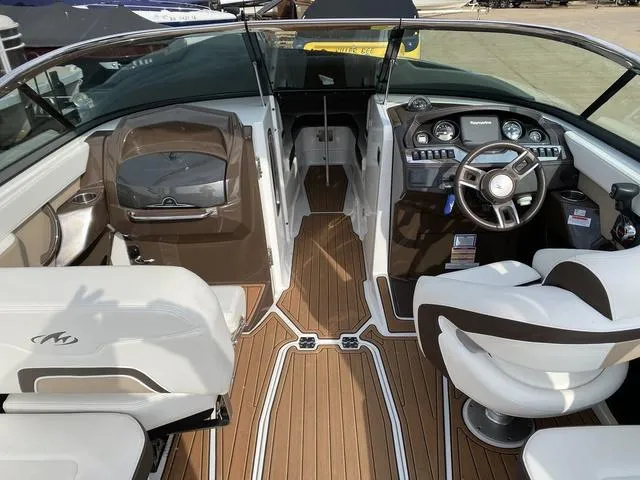 Slide: The Image of 2017 Monterey 278SS boat interior with modern dashboard and seating. - 9