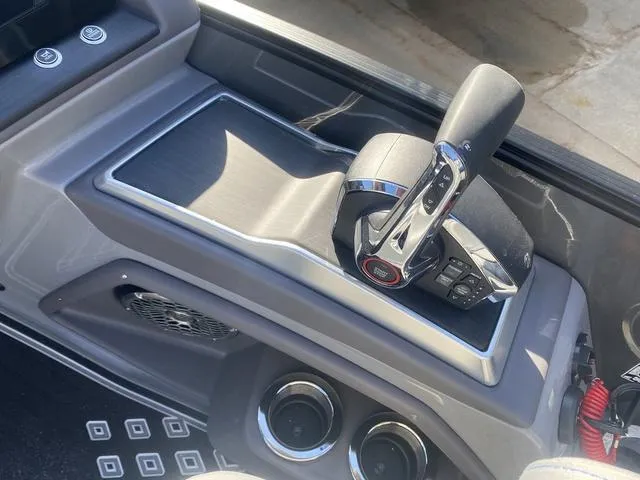 Slide: The Image of 2025 Bennington 25 QFBA boat throttle control and console detail. - 19