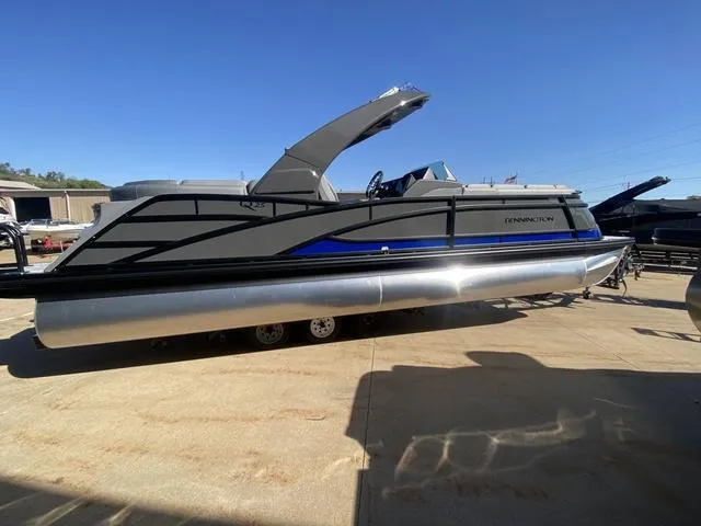Slide: The Image of 2025 Bennington 25 QFBA pontoon boat with sleek design and modern features. - 2