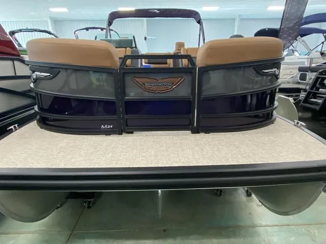 Slide: The Image of 2025 Bennington 24' MSB Tri-Toon boat, rear view in showroom. - 3