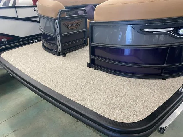 Slide: The Image of 2025 Bennington 24' MSB Tri-Toon boat deck with stylish seating and modern design. - 4