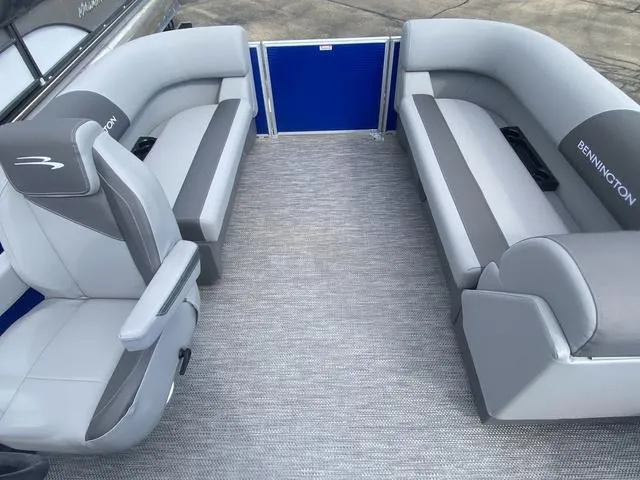 Slide: The Image of 2024 Bennington 20 SVSR-SPS boat dashboard with steering wheel and controls. - 10