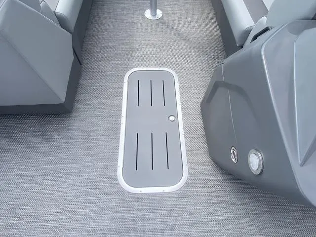 Slide: The Image of 2024 Bennington 20 SVSR-SPS boat interior with seating and table featuring cup holders. - 12